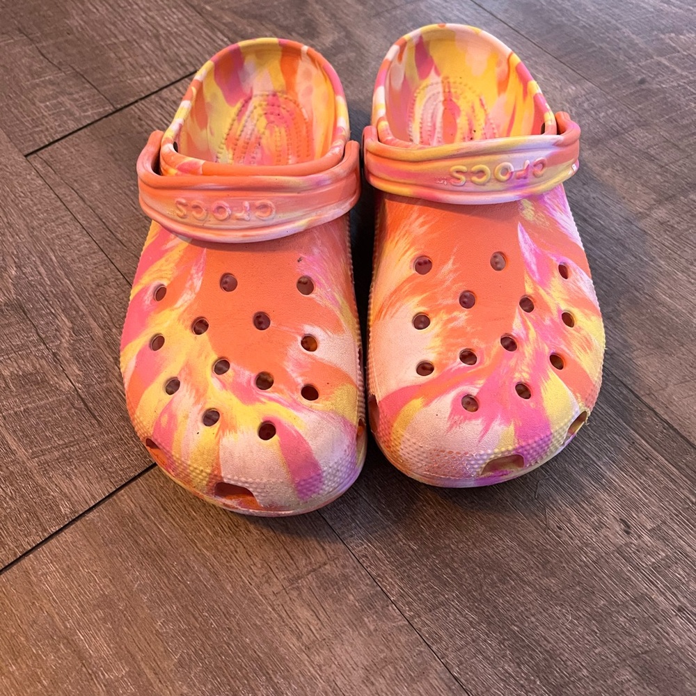 Orange yellow and white crocs